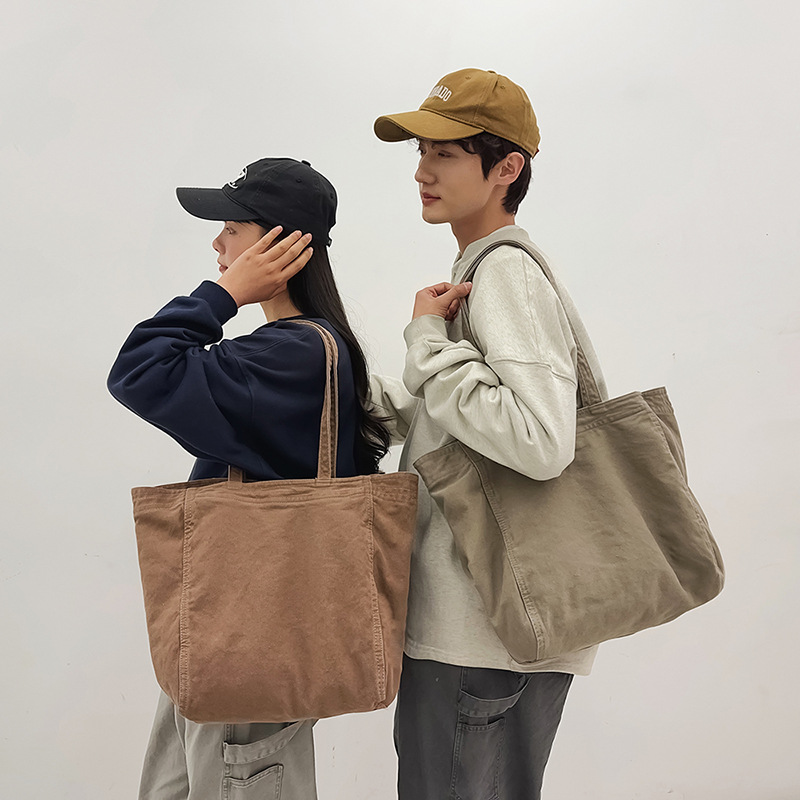 Bolso tote de lona de color sólido retro de gran capacidad de viento perezoso 2025 nuevo bolso de hombro simple de moda al por mayor