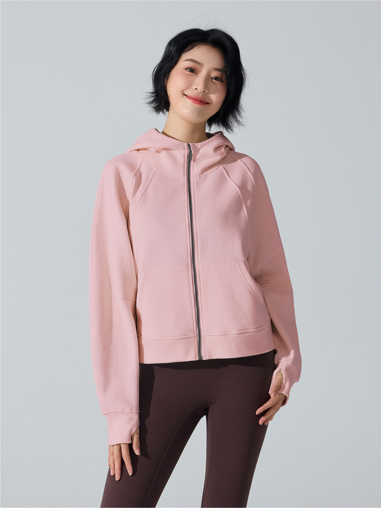 Otoño y invierno de moda con cremallera camiseta encapuchada calentadora y camiseta deportiva casual universal cardigan chaqueta de yoga superior mujer