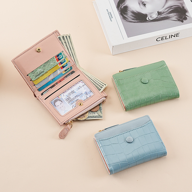 Nuevo monedero de cambio corto y simple transfronterizo, bolsa de monedas con cremallera mini ultra delgada multi-tarjeta bolso de botón de billetera