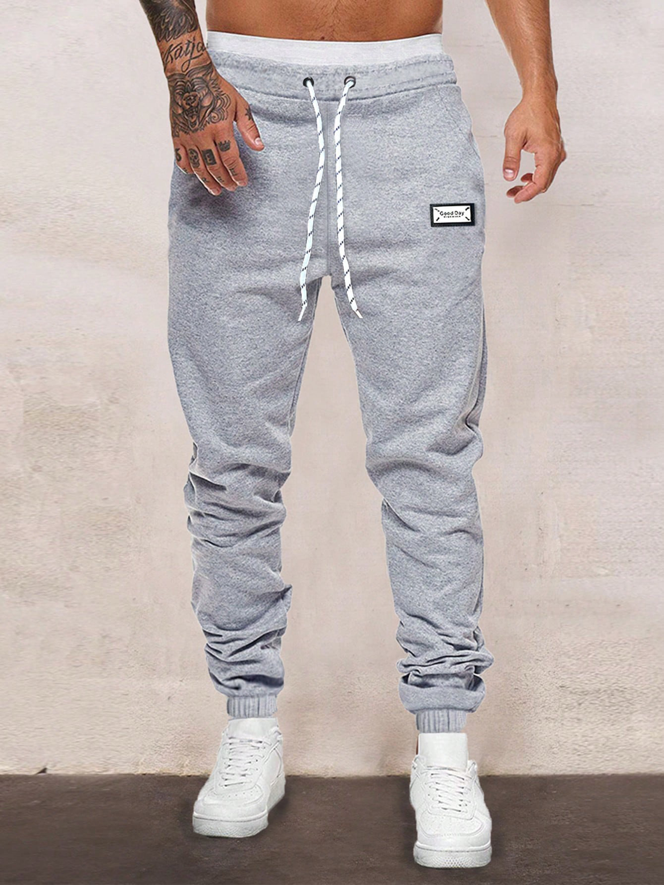 Men's Clothing Slim Fit Elastic Jogger Pants New Style High Quality Knitted Fabric_voghion.com