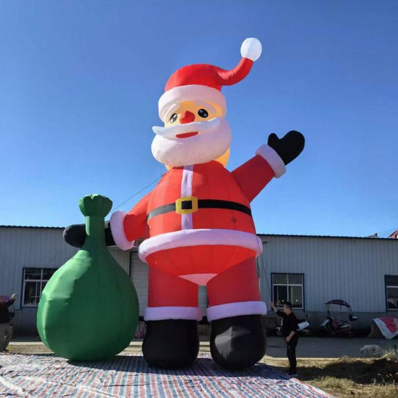 Explosiones de venta super llamativa decoración inflable gigante de alto valor facial resistente al usuario exterior interior universal modelo de aire de Santa Claus