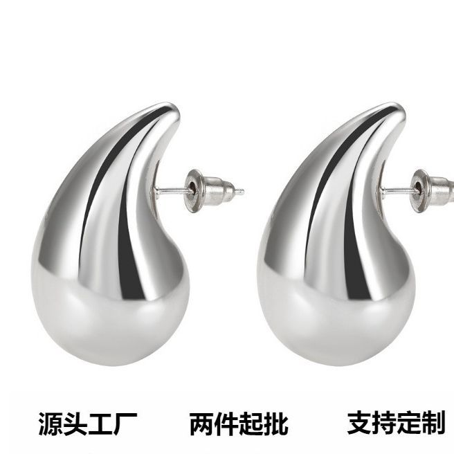 trend elegant fashionable golden earrings drop-shaped