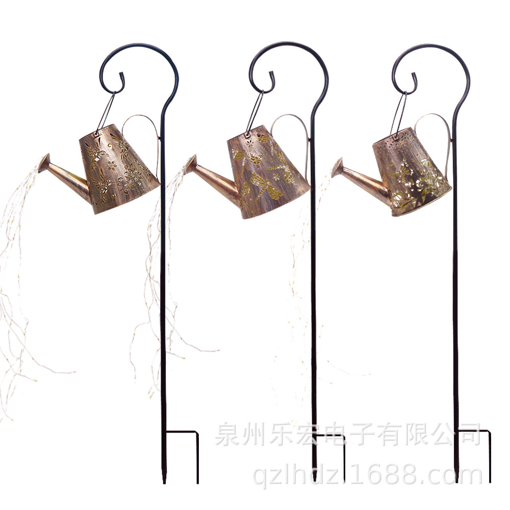 Transfronterizo nueva caldera de hierro lámpara de césped lámpara de jardín lámpara de paisaje agua Libélula lámpara de proyección de dibujos animados