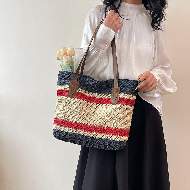 Wholesale of new straw woven bags for Spring 2025, large-capacity cross-border trendy and fashionable tote bags, casual commuting underarm bags undefined