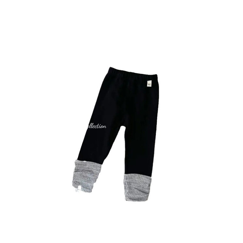 Qi Qiqi niñas dulce otoño nuevo estilo de niños coreanos estilo de empalme extranjero pantalones casuales pantalones de primavera y otoño