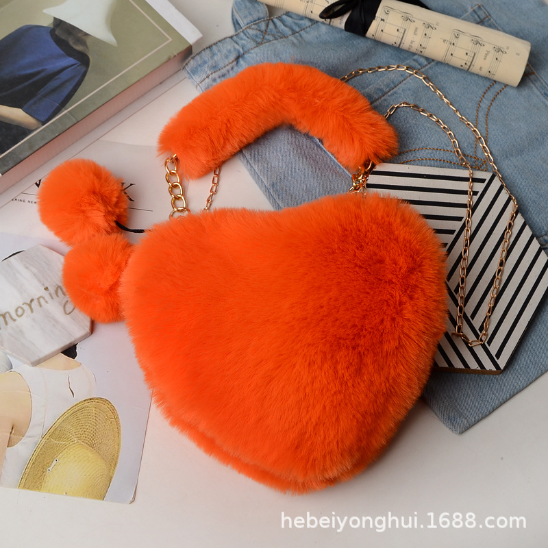 Fabricante en stock bolsa de corazón de melocotón portátil moda felpa en forma de corazón bolsa de peluche bolso de las mujeres