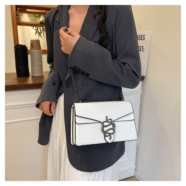 Women's PU Solid Color Snake Elegant Square Magnetic Buckle Crossbody Bag Square Bag Underarm Bag display picture 4