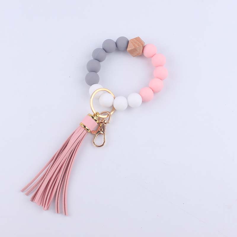 Pulsera de silicona pulsera llavero nuevo creativo DIY borla colgante contraste color