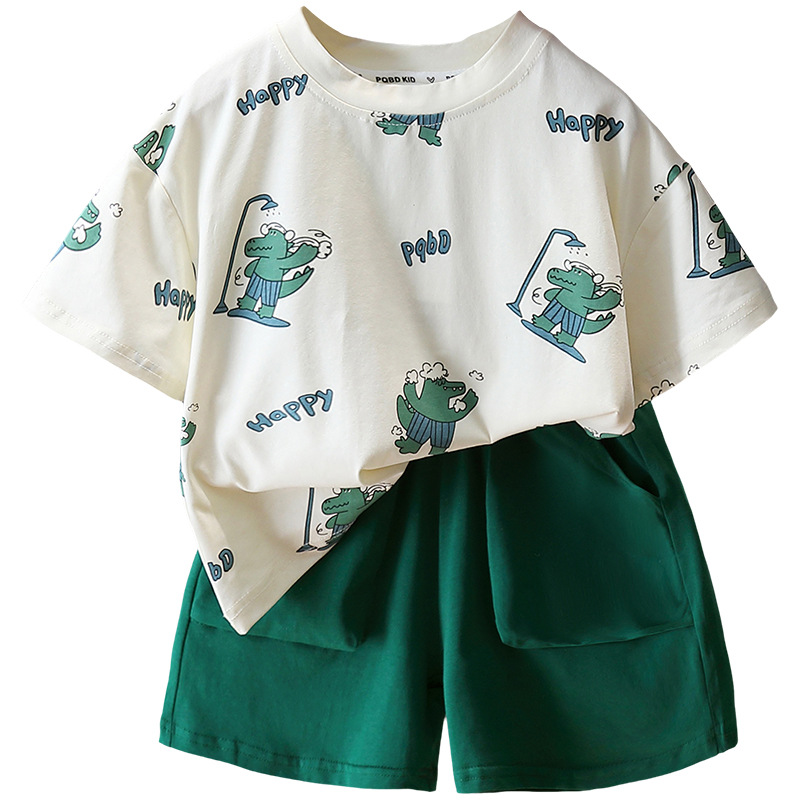 7947 Traje de manga corta para niños 2025 Nuevo verano Camiseta con estampado de dinosaurios de dibujos animados para niños Ropa de moda de verano