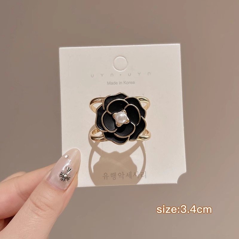 Botón de toalla de seda de alta calidad para mujer de alta gama 2025 nuevo estilo arco esquina anudada camisa de flores serpentina anudada hebilla anudada