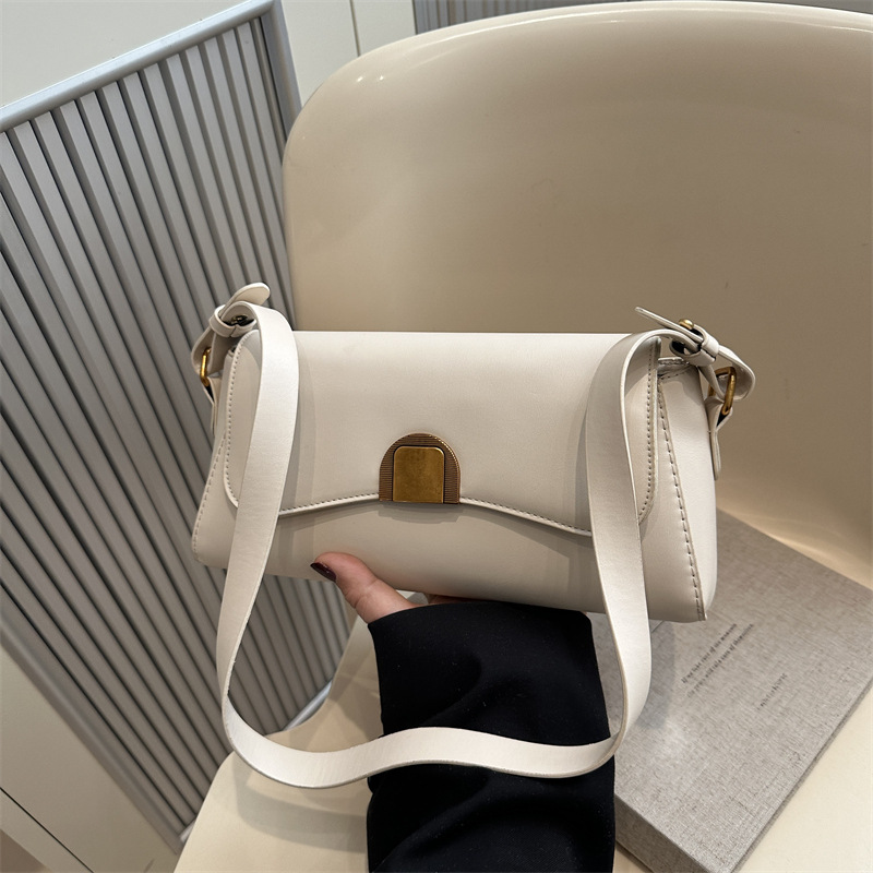 Bolsa de moda de tendencia 2025 primavera nuevo simple ocio de hombro bolso cuadrado sensación extranjera nicho mochila