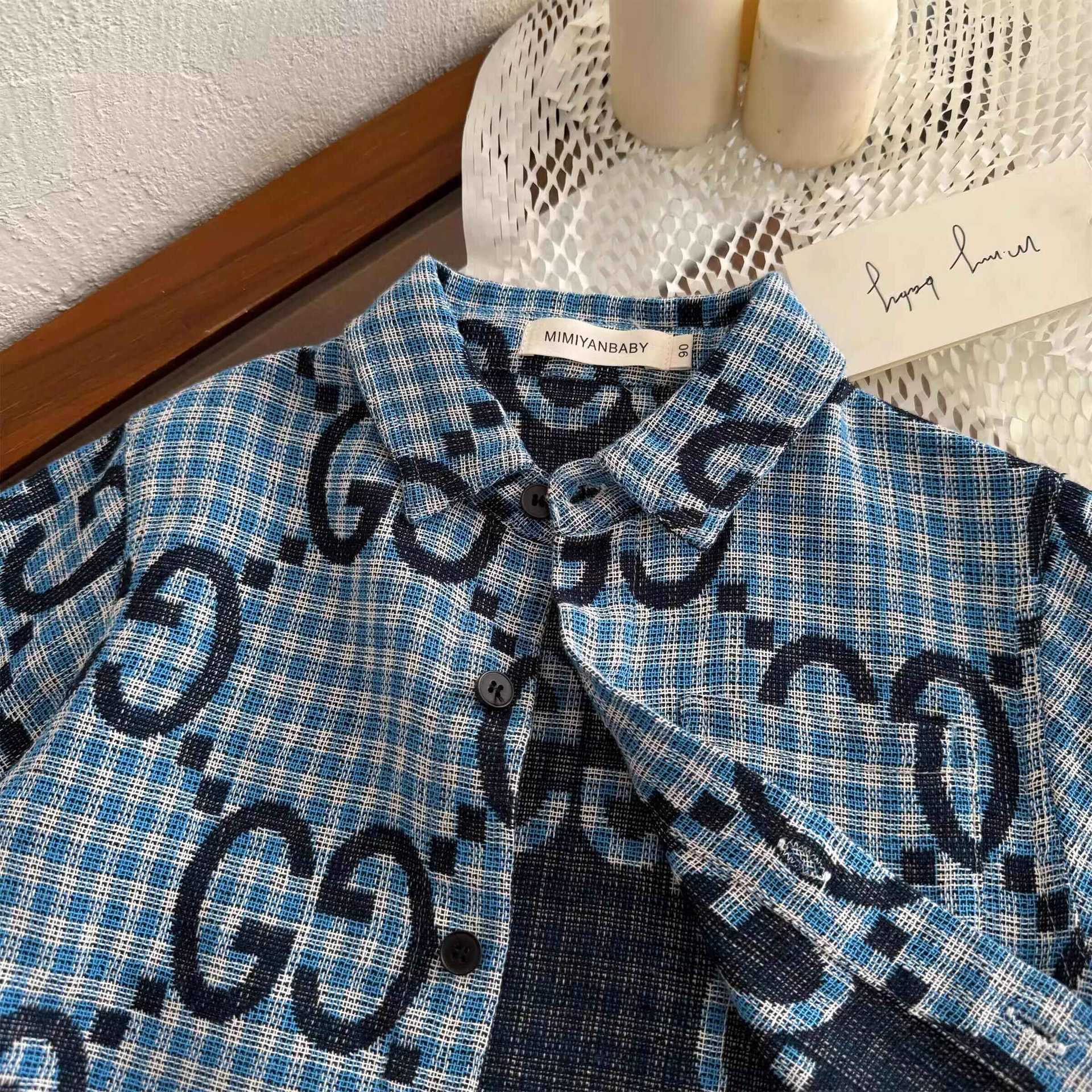Camisas de mangas largas para niños de estrellas redondas de primavera 2025 camisas de moda de moda para niños y niñas bebés de impresión completa chaqueta a cuadros
