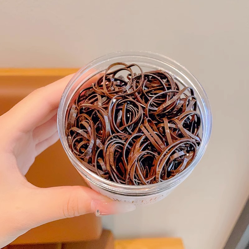 El cabello del bebé está atado, la banda elástica alta, la banda elástica desechable, la trompeta de color para niños no daña el cabello, la banda elástica pequeña