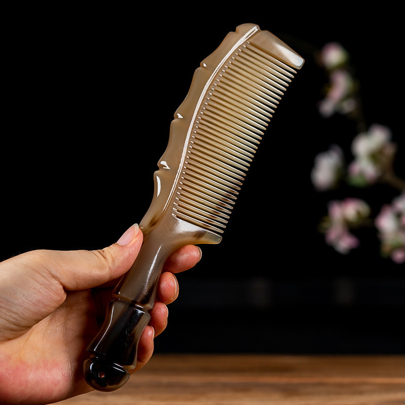 メーカー卸売純粋な天然ヤクの角コームロングヘアマッサージ竹穴ハンドル帯電防止コーム女性のためのクリエイティブな包装|undefined