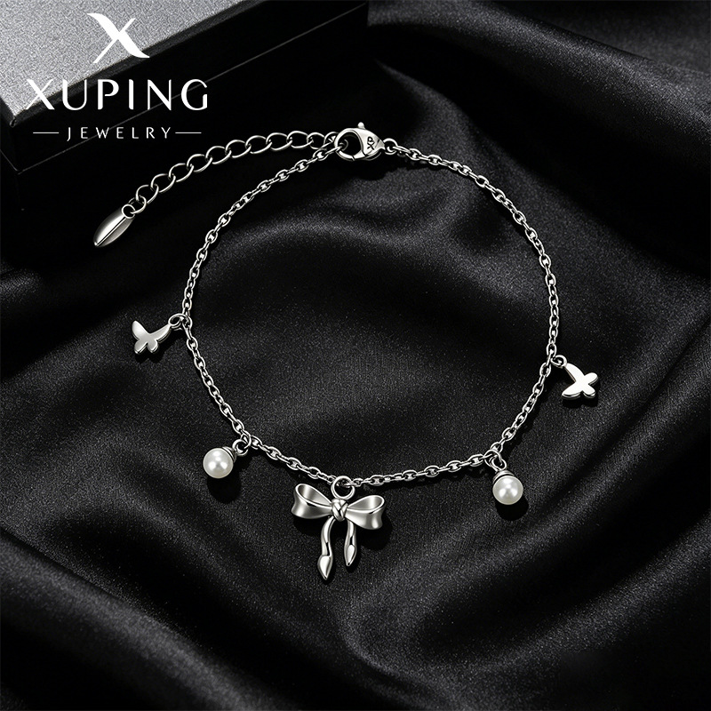 Xuping mariposa imitación de perlas pulsera de bordillo dulce temperamento suave aleación de cobre chapado blanco joyas al por mayor transfronterizas