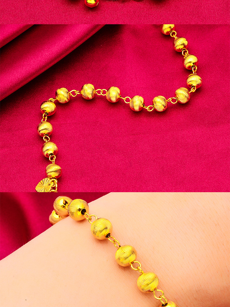 Pulsera unisex de moda con diseño de ojo de gato en oro y arena_voghion.com