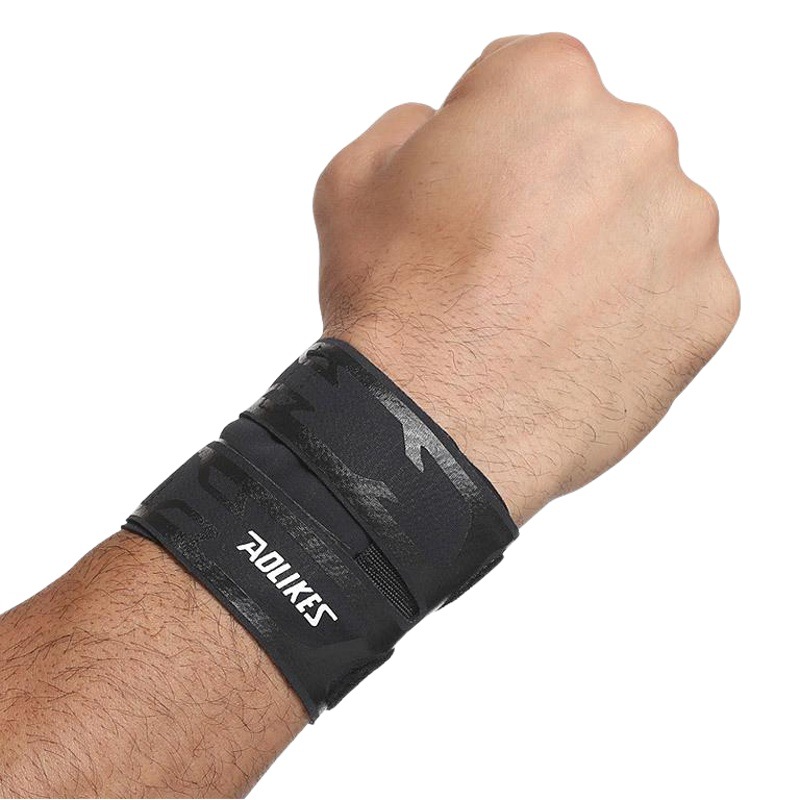 Deportes transpirable pulsera delgada de los hombres de la aptitud Anti-Esguince presión baloncesto bádminton tenis Correa profesional protector de muñeca de cuero