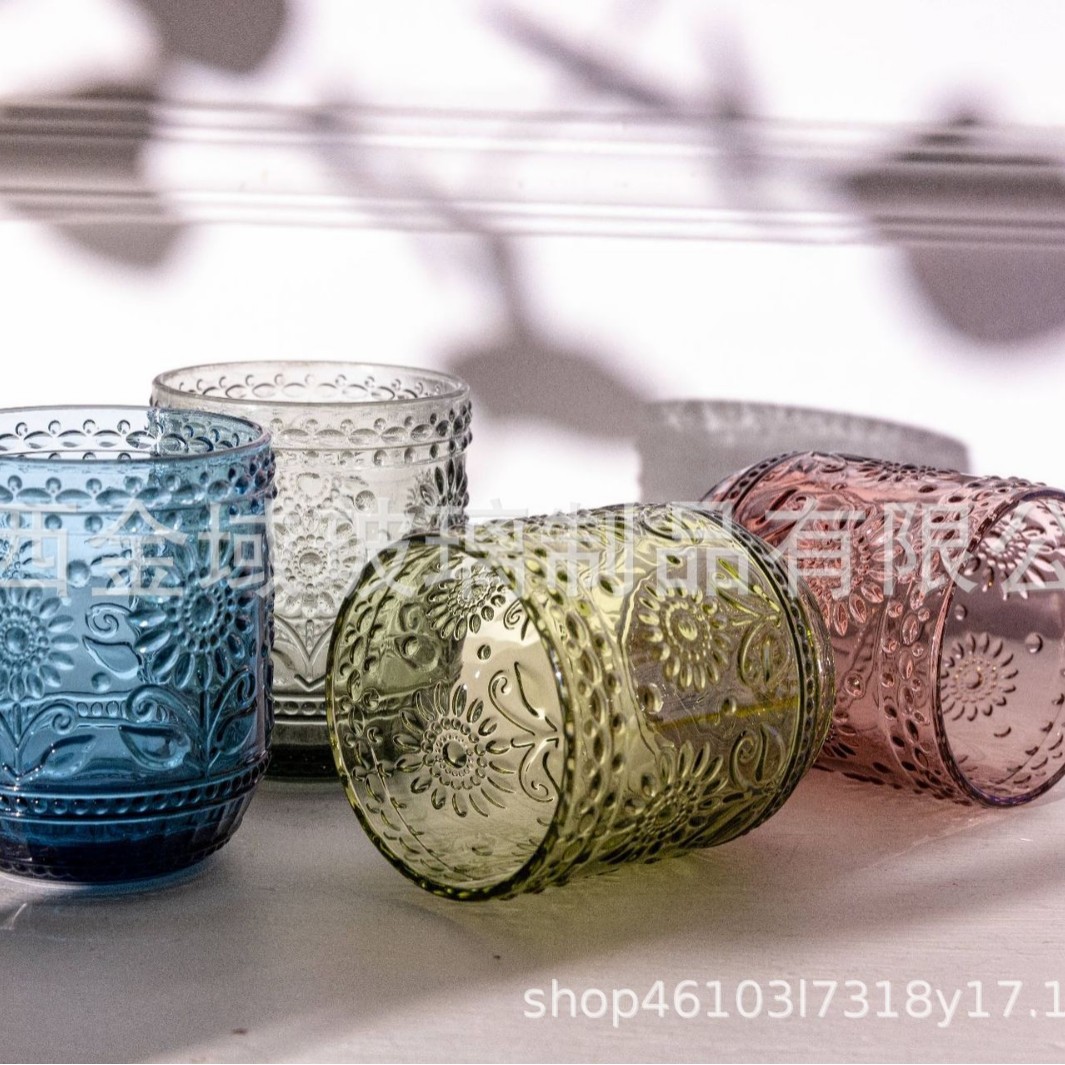 Taza de agua de vidrio con patrón de color de flor de sol en relieve retro al por mayor, taza de jugo de leche para el hogar de girasol, taza de bebida fría