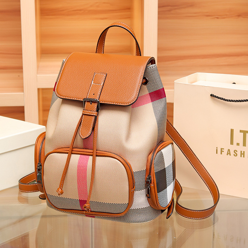 Bolso de hombro de cuero genuino mujer 2024 nueva mochila casual de gran capacidad con patrón de moda mujer bolso de viaje simple y popular moda