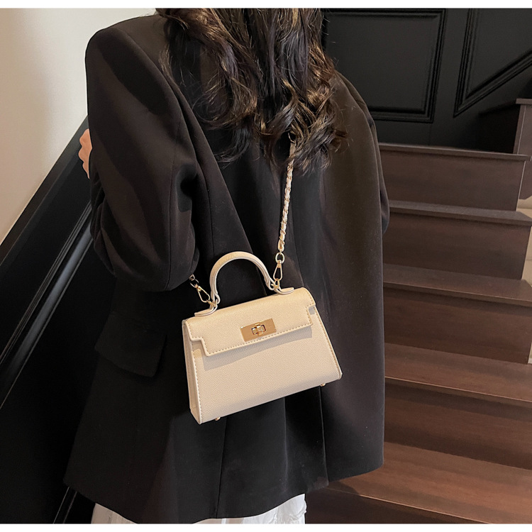 Bolso de mujer 2026, nuevo modelo transfronterizo, bolso de mano de textura de alta calidad, bolso cuadrado pequeño Kelly, bolso de hombro cruzado de moda francesa.