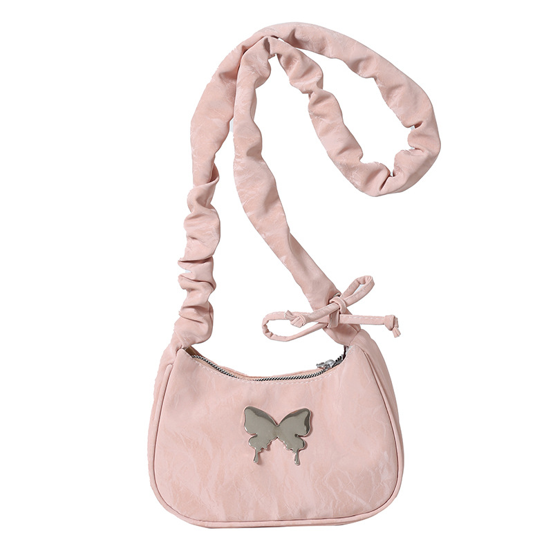 Correa de hombro plegada diseño de mariposa de hombro único bolso de brazo para mujeres este año popular 2024 nuevo estilo extranjero bolso de moda de color sólido