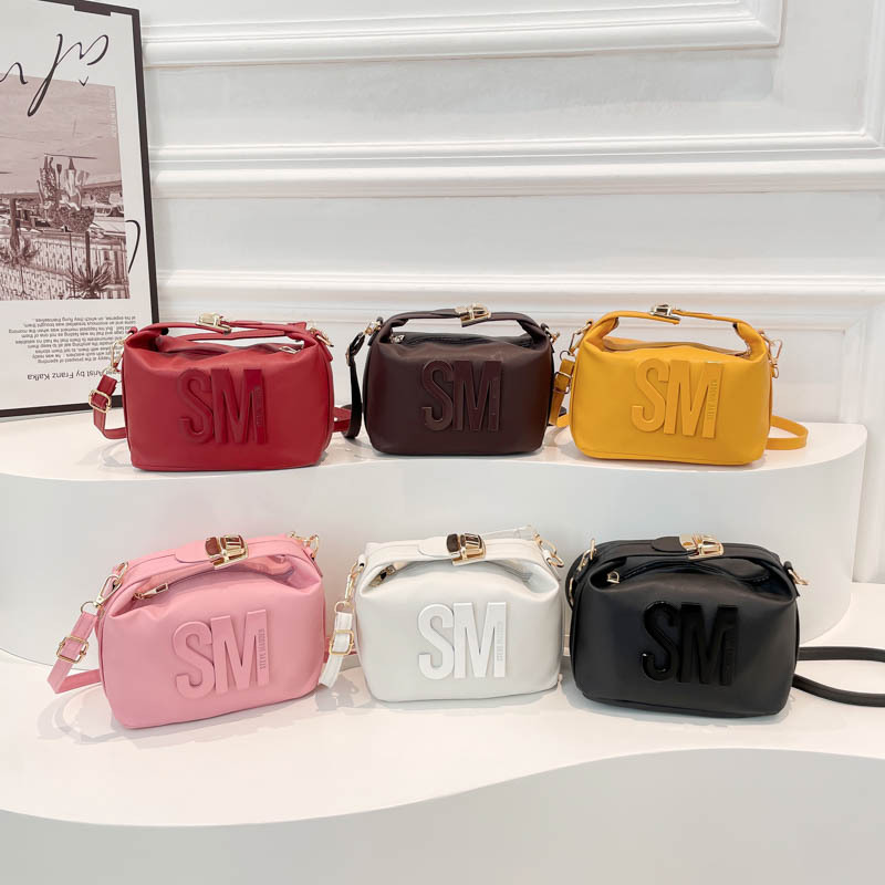 Bolso de hombro 2025 primavera nueva bolsa de cámara ancha correa de hombro letras bolso de moda simple mochila de estilo extranjero mujer