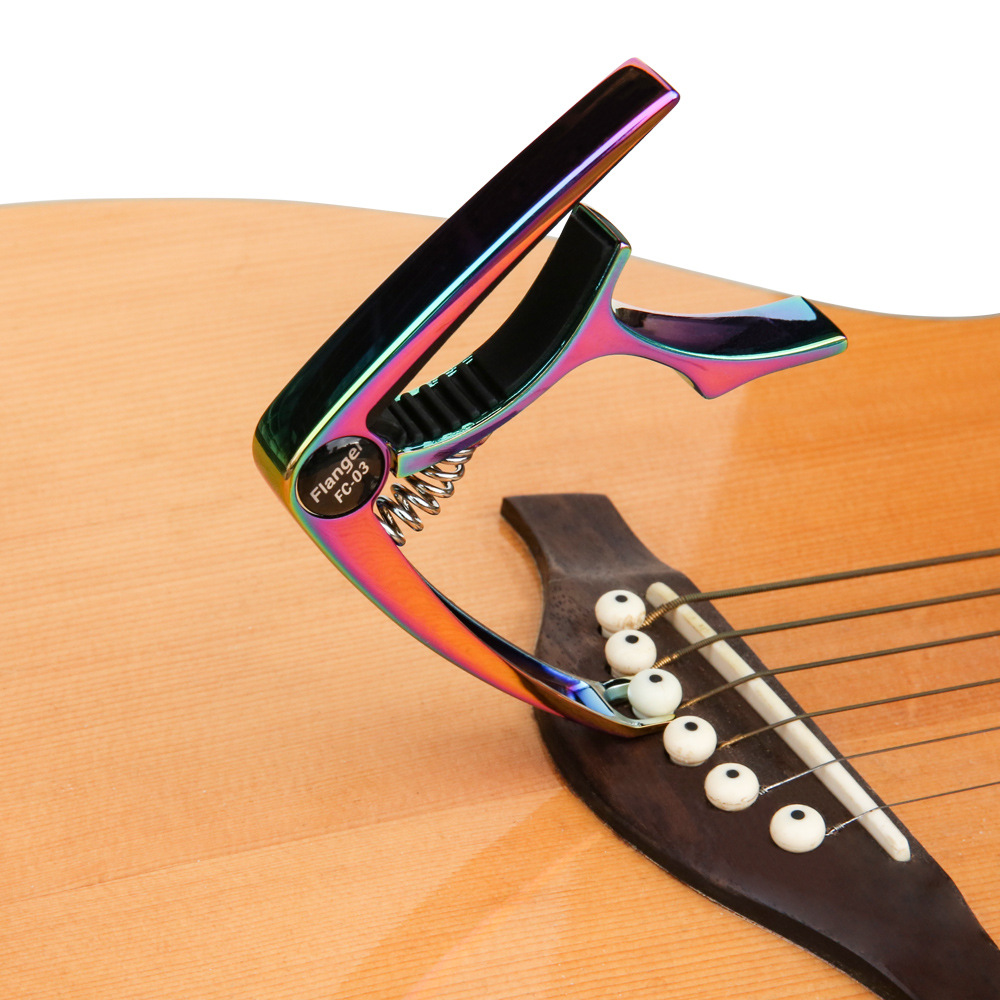 Capotasto per chitarra acustica e fonica Flanger Folk, accessori per chitarra_voghion.com