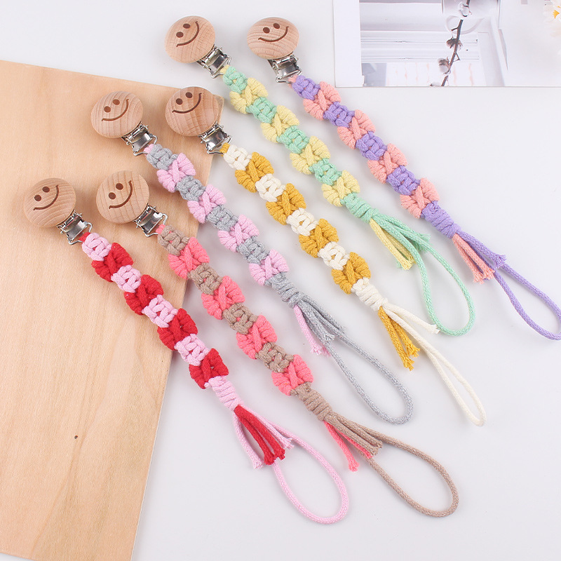 Productos para bebés de beech sonriente clip de tetina creativo puro tejido a mano cuerda de tetina de textura de arco anti-caída cadena