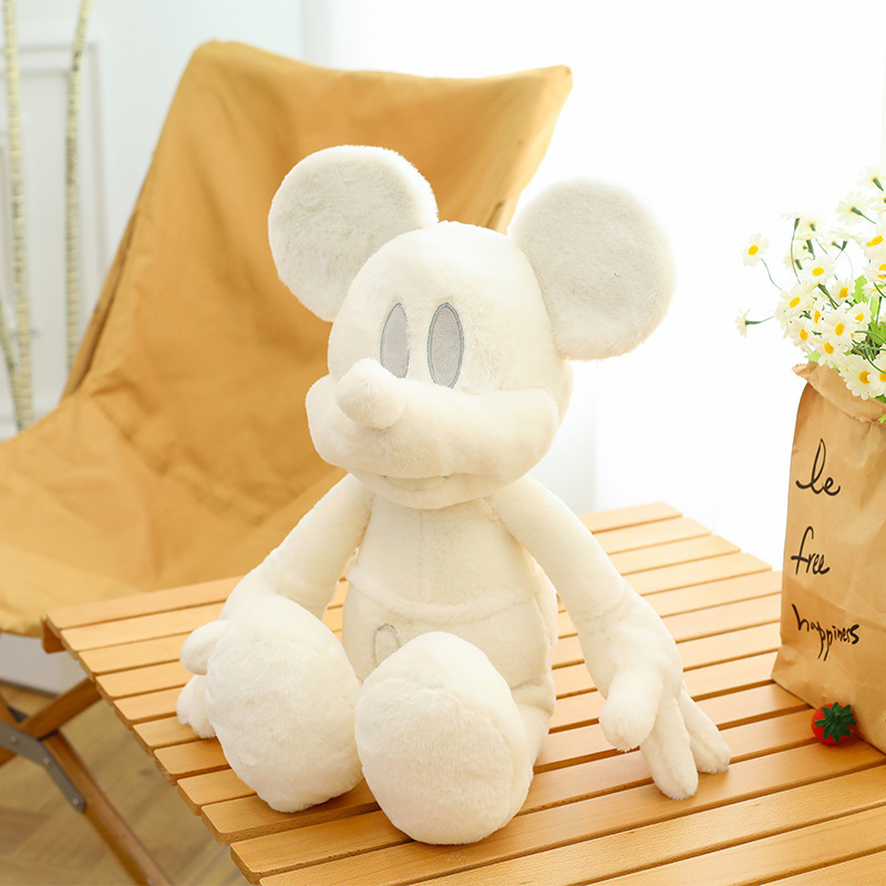 ネットの赤い同型のサムのミッキーのぬいぐるみのぬいぐるみのミッキーマウスの人形の客間は子供を飾って寝て枕を抱きます。|undefined