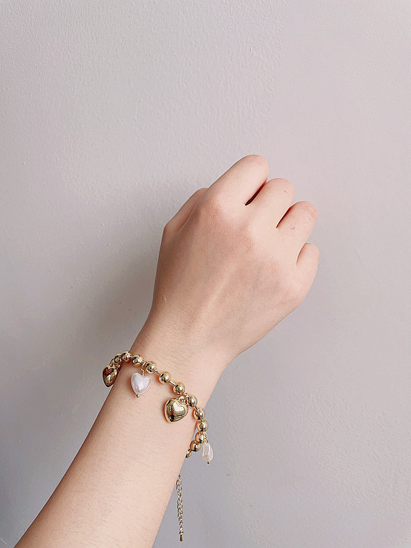 Koreanischer Stil Herz Gold Perle Armband Großhandel display picture 1