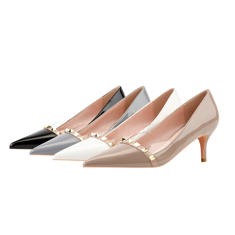 869-1 in Europe and the sexy show thin transparent high heels with patent leather high heel lighter pointed metal rivets shoes
