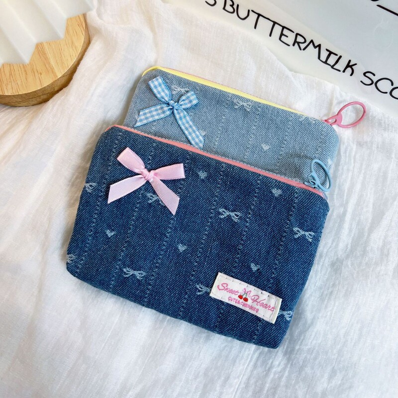 New Original Niche Cute Denim Bow Girls Coin Purse Portable Skin Care Product Hand Cosmetic Bag Storage