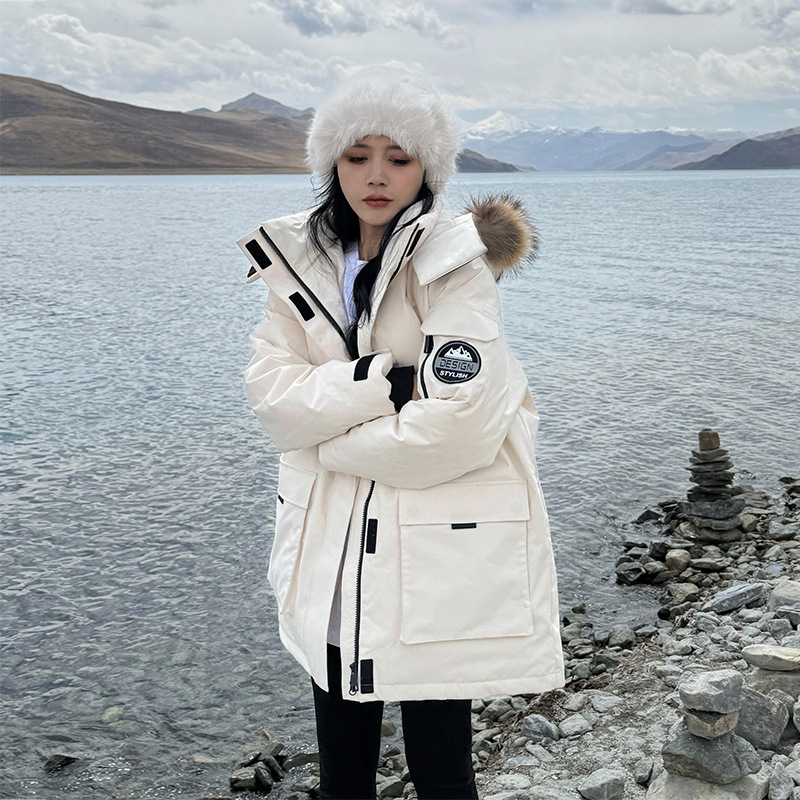 Chaqueta de algodón de pluma para mujeres de invierno 2024 nueva chaqueta de algodón de cuello grande grueso chaqueta de nicho suelta pareja de trabajo para superar