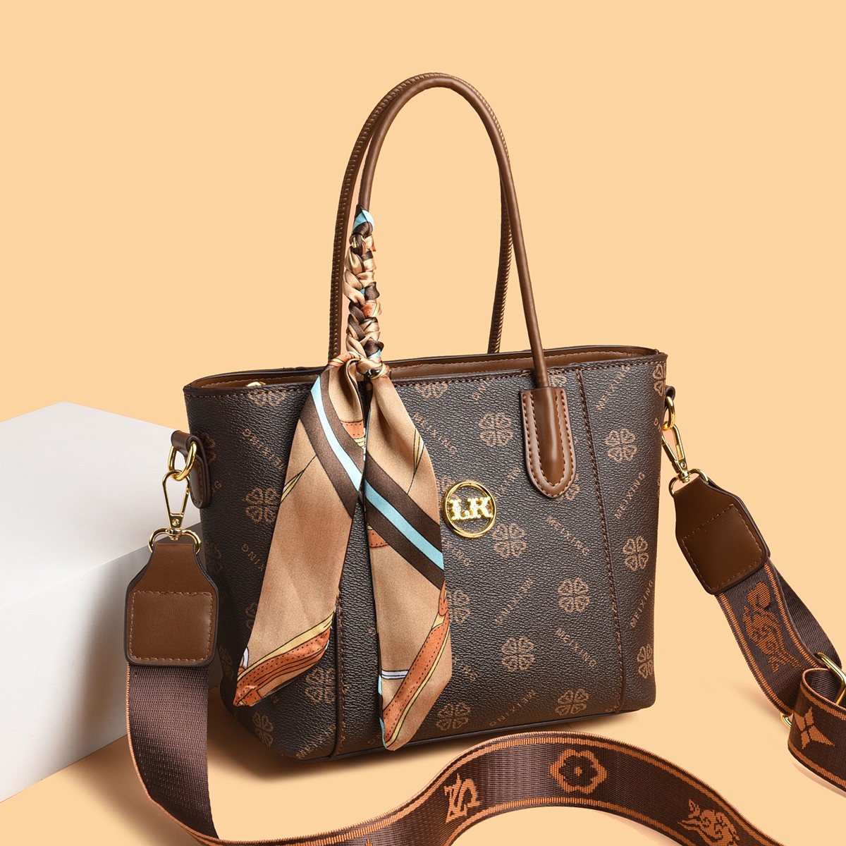 High-sense femenino 2025 nuevo bolso cuadrado impreso simple de gran capacidad textura retro bolso portátil de un solo hombro