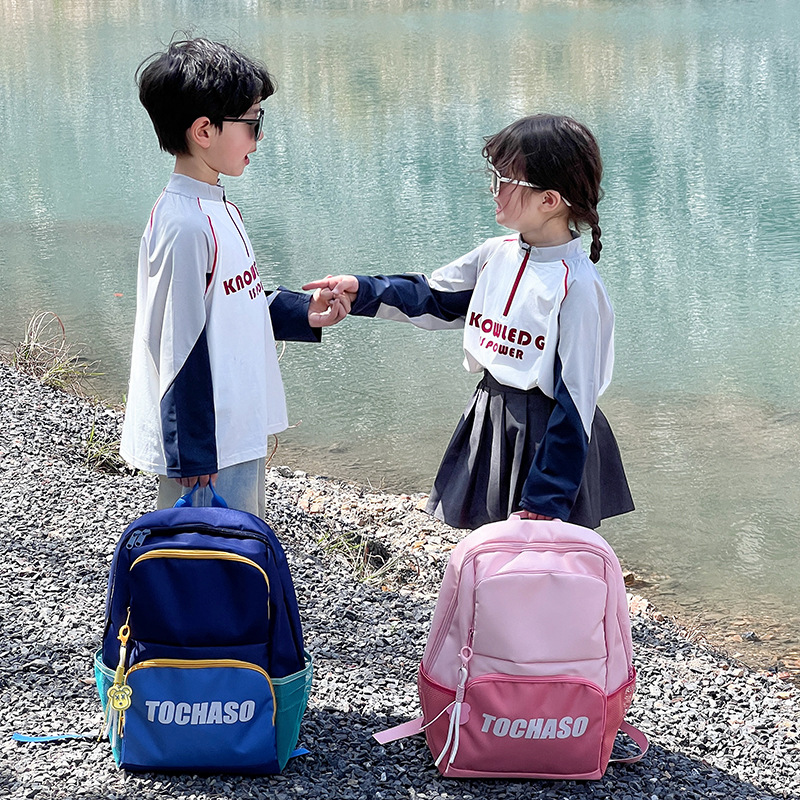 Mochila de moda para niños y niñas en contraste, letras de estilo occidental, mochila escolar de escuela primaria de gran capacidad, nueva mochila para niños transfronteriza