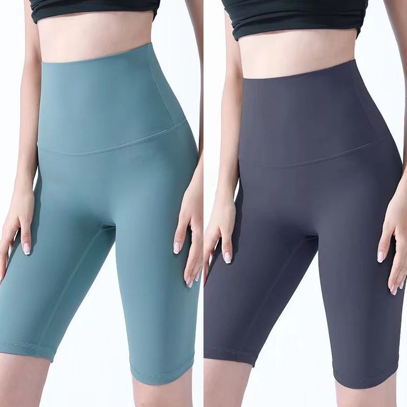 Pantalones cortos desnudos de mujer elásticos apretados para elevar las caderas de cinco puntos pantalones deportivos de secado rápido succión de sudor entrenamiento para correr fábrica de comercio de ping