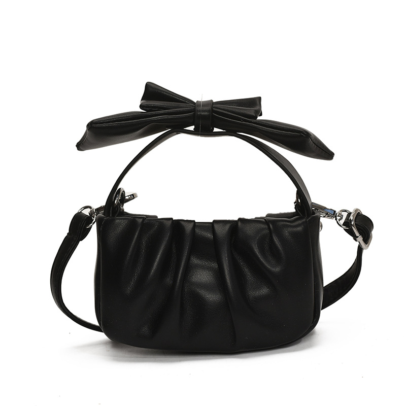 Versión coreana del bolso de nube de niña de color sólido simple estilo occidental pliegue lindo lazo bolso de bebé nuevo bolso para niños