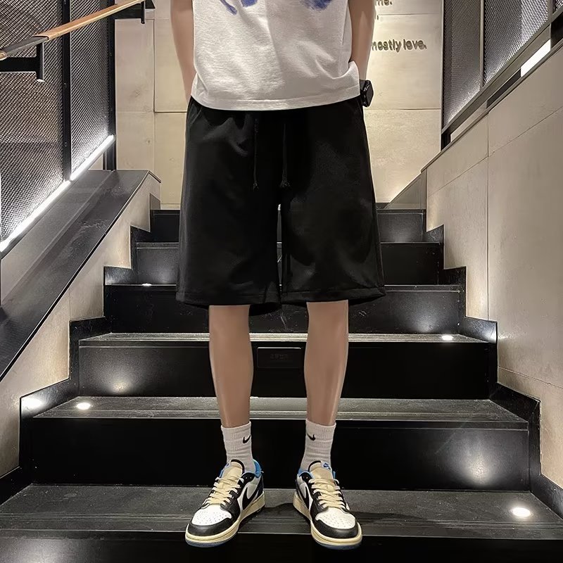 Marca de moda ins pantalones cortos casuales de verano para hombres estilo caliente holgado tendencia casual ropa exterior pantalones de cinco puntos de estilo coreano de todo fósforo