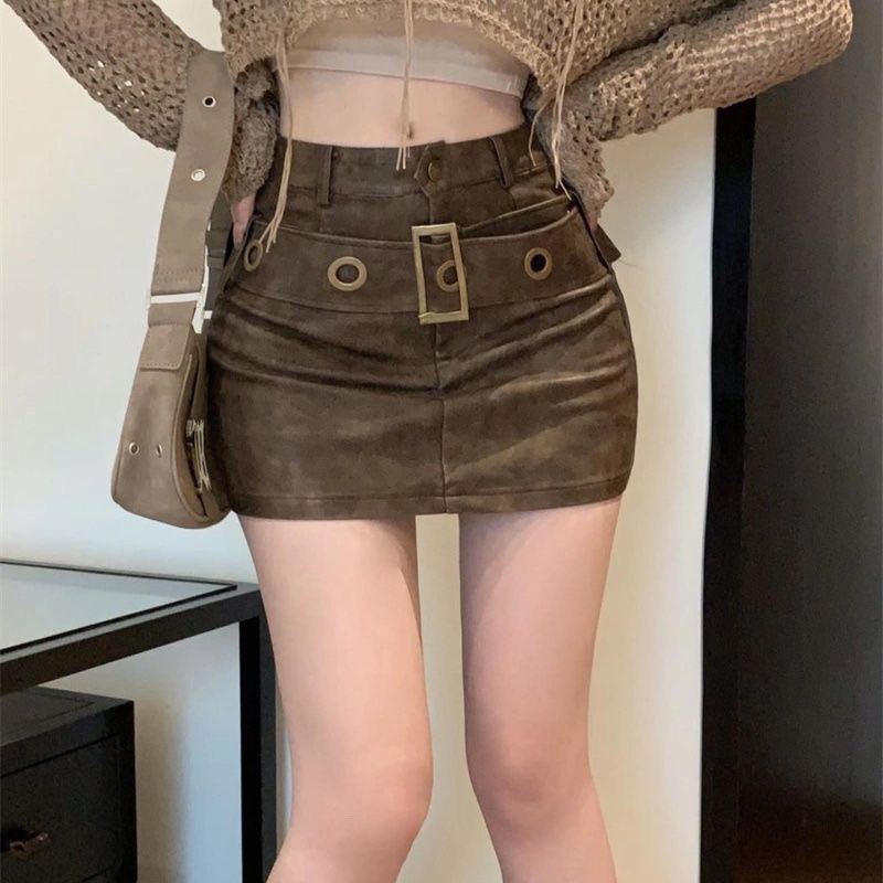 Retro brown leather skirt and women's 2025 autumn and winter new hot girl skirt temperament tight hip skirt
