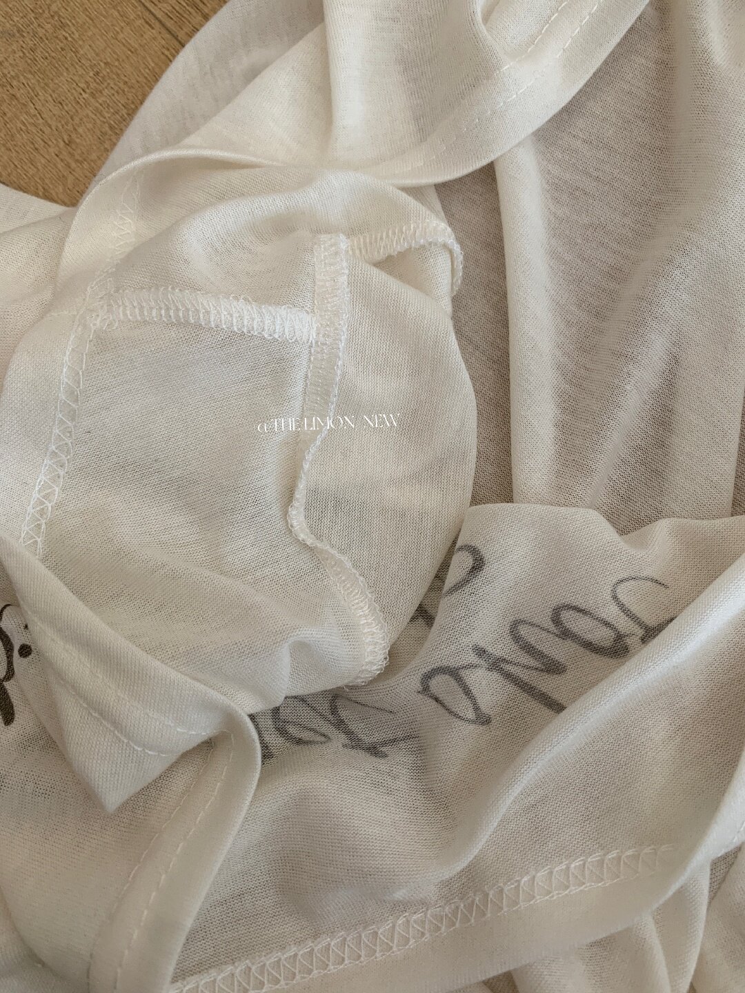 Áo thun nữ tay dài cổ tròn in chữ, phong cách Hàn Quốc, chất liệu cotton thoáng mát — màu đen, màu trắng, màu xám, màu vàng chi tiết 80