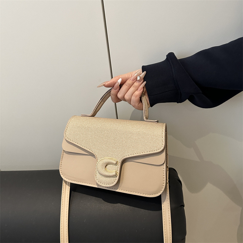 Trendy de verano 2025 nuevo bolso cuadrado pequeño de color en contraste bolso de moda bolso diagonal portátil de textura occidental de todo fósforo para mujer
