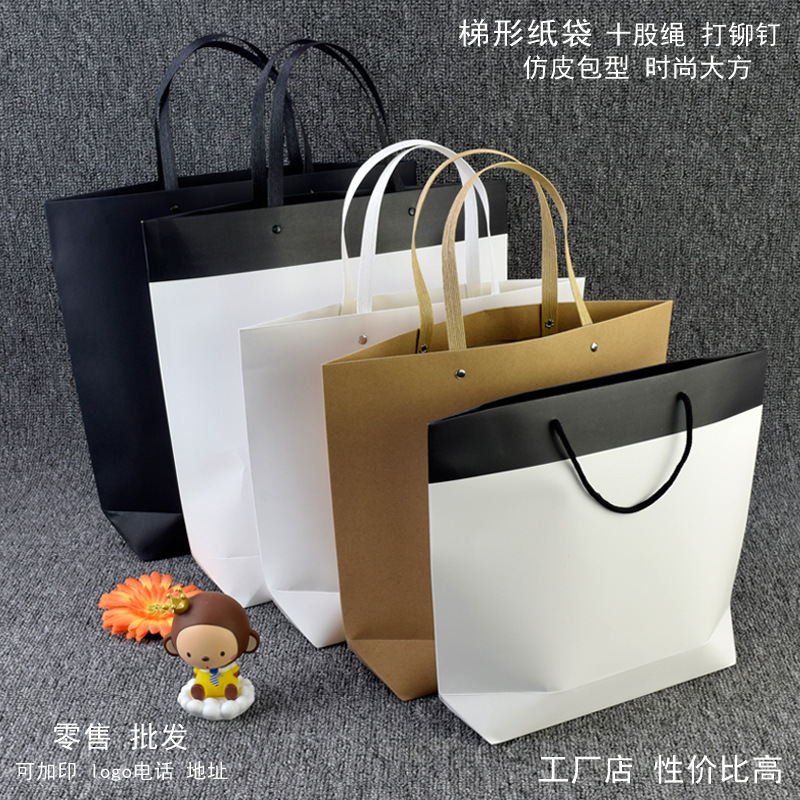 船型时尚服装纸袋 批发 礼品袋子  铆钉现货手提纸袋 可加印