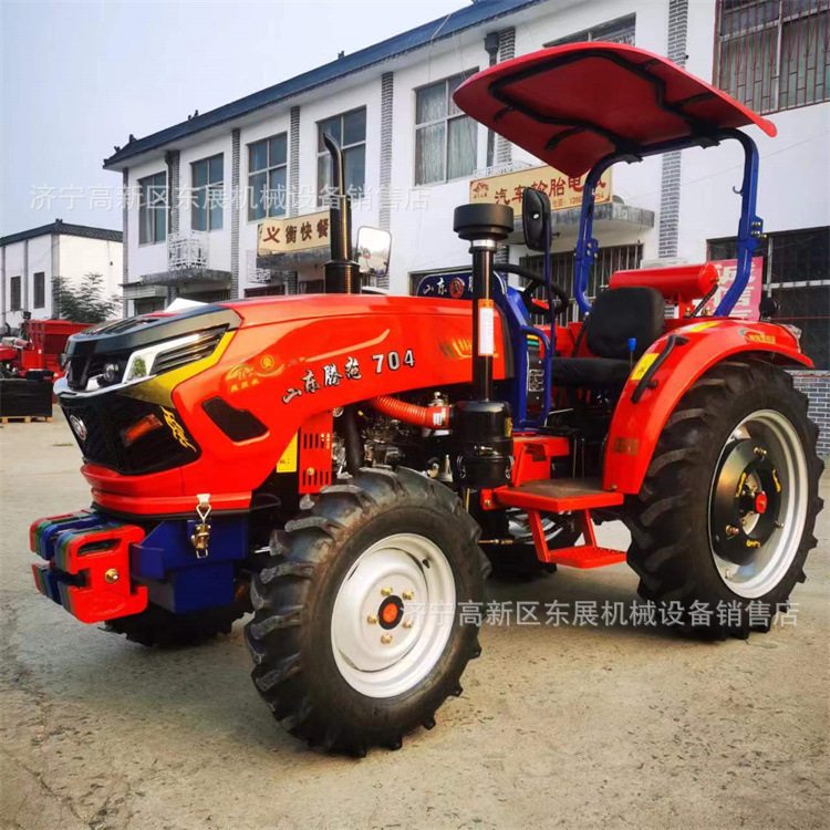 品质供应多功能轮式四驱拖拉机 配套各种耕整收获农具四轮拖拉机