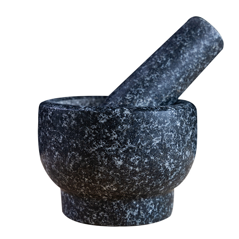 un cilindro de piedra negra tipo molino de piedra de grasa