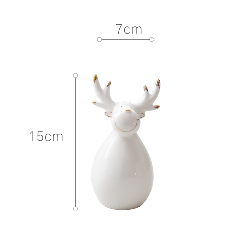 クリスマスの鈴雪だるまのヘラジカの陶磁器の置物を処理します。|undefined