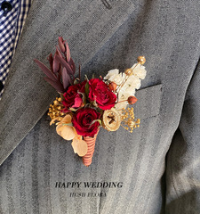 Serene floral arrangement with preserved everlasting hydrangeas, pinecones, and a chest flower for the groom's wedding, business opening, meeting, or graduation gift.