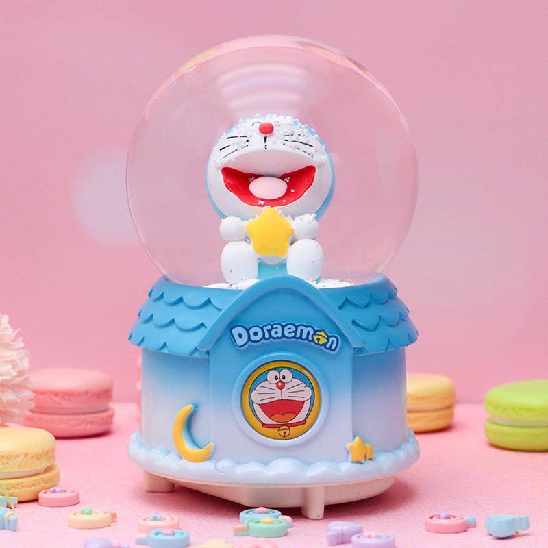 Linda campana tren azul gordo bola de cristal caja de música para niños y compañeros de clase regalo caja de música de nieve brillante