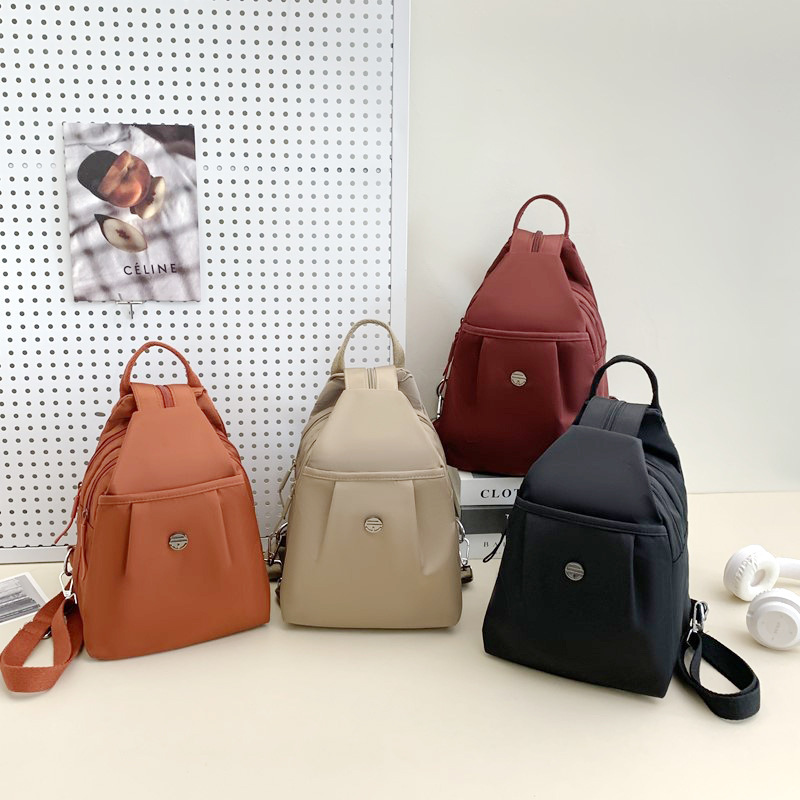 ミニバックパック 2025 新しいシンプルで多用途の盗難防止女性のチェストバッグファッショナブルなオックスフォード布カジュアル小さなバックパック|undefined