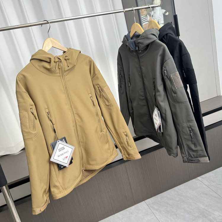 Men's autumn and winter outdoor softshell jacket with fleece lining, water-resistant, warm, and featuring a stand-up collar and hood, perfect for casual wear