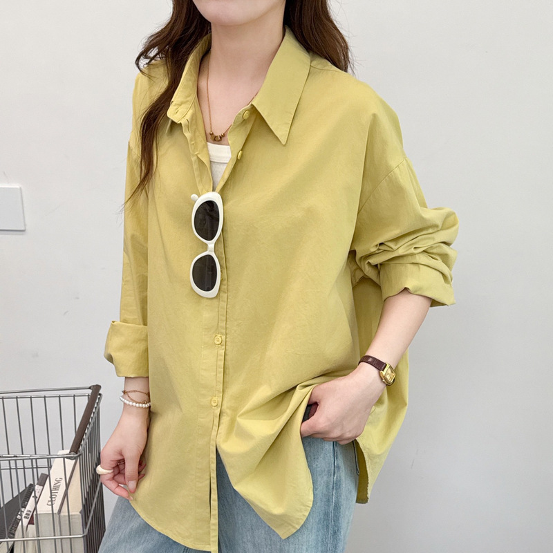 Solid color long-sleeve shirt 2026, simple Korean style with a lapel and placket design, casual and versatile loose-fitting top Solid color long-sleeve shirt 2026, simple Korean style with a lapel and placket design, casual and versatile loose-fitting top